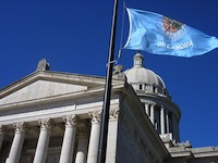 Oklahoma capitol and flag